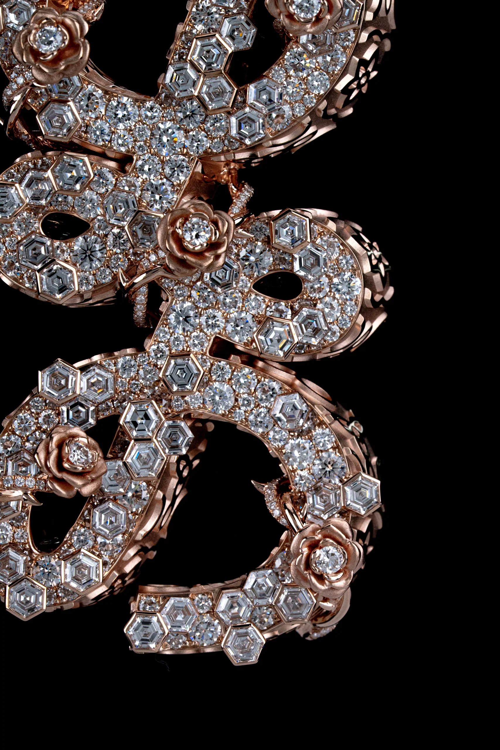 The clasp of the piece traced in low, warm highlight.