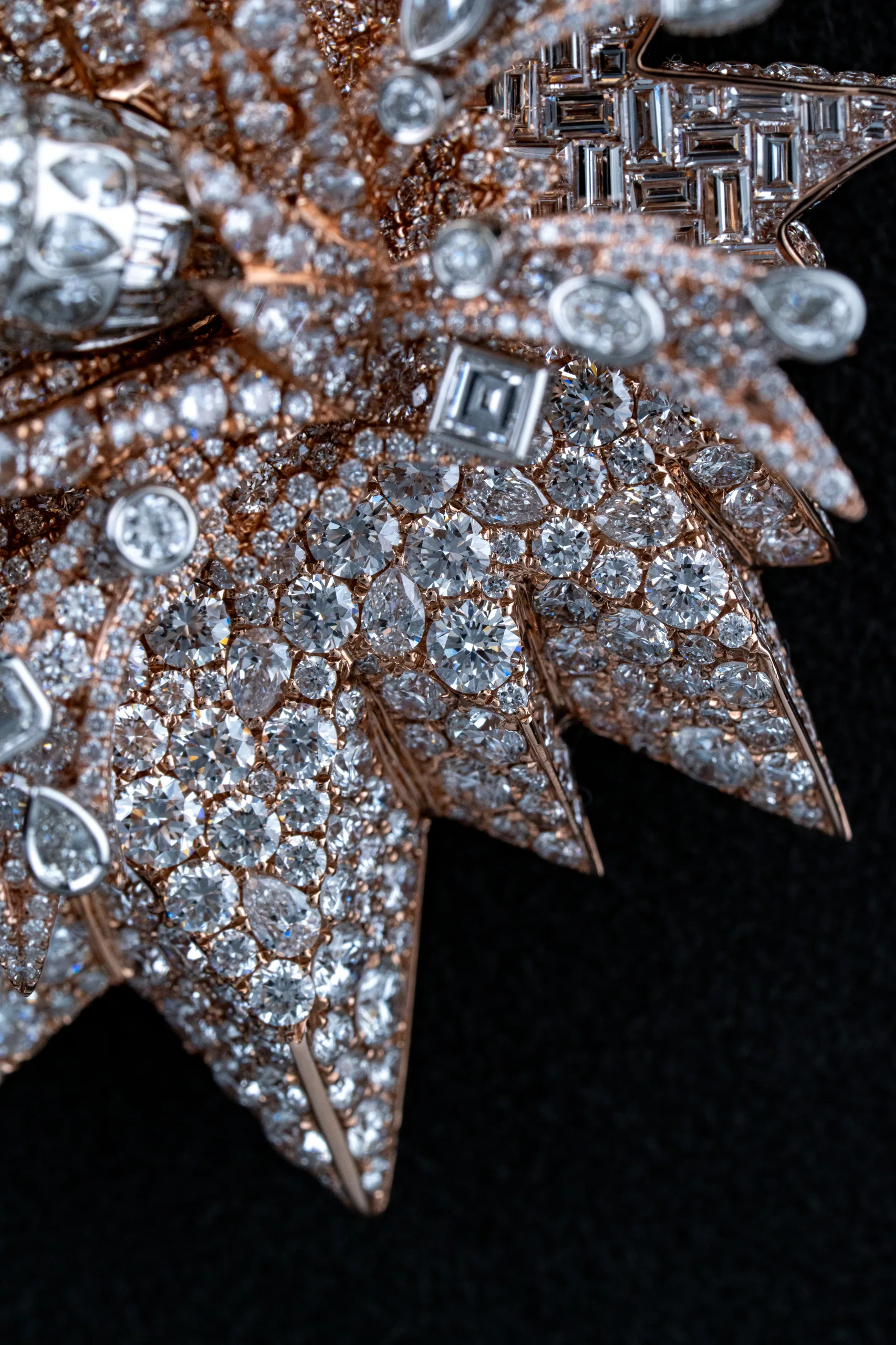 The pendant's silhouette emerging from surrounding darkness.