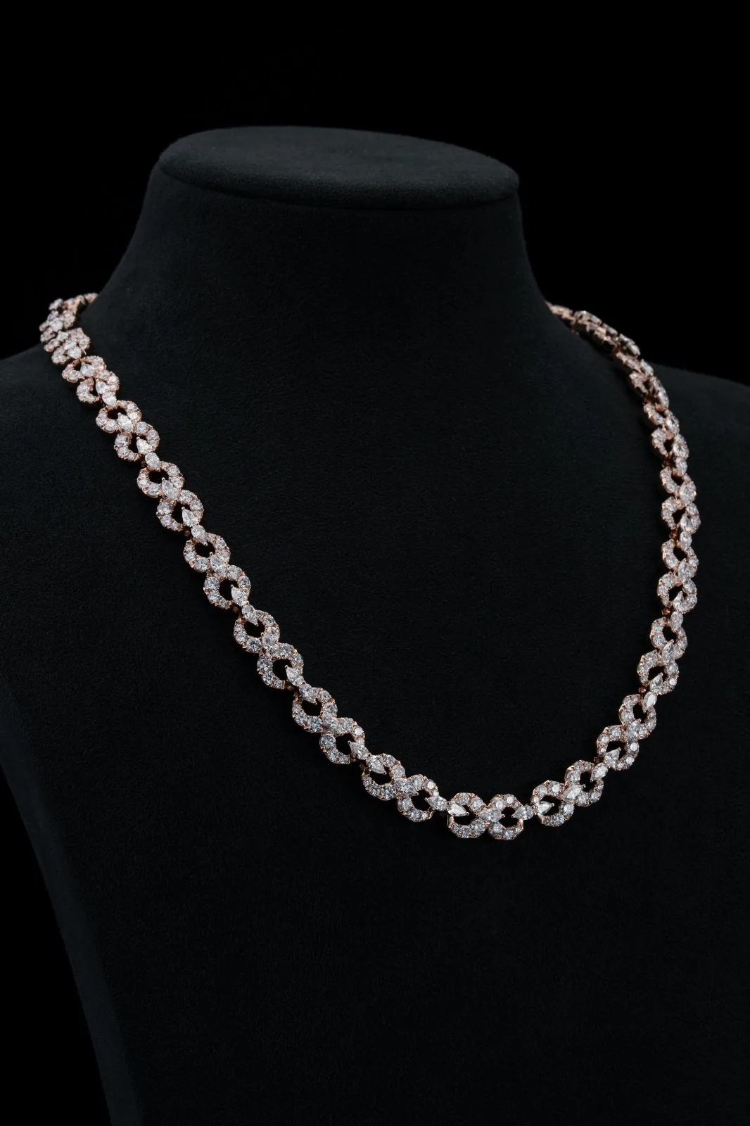 The necklace on its bust, seen from slightly above.