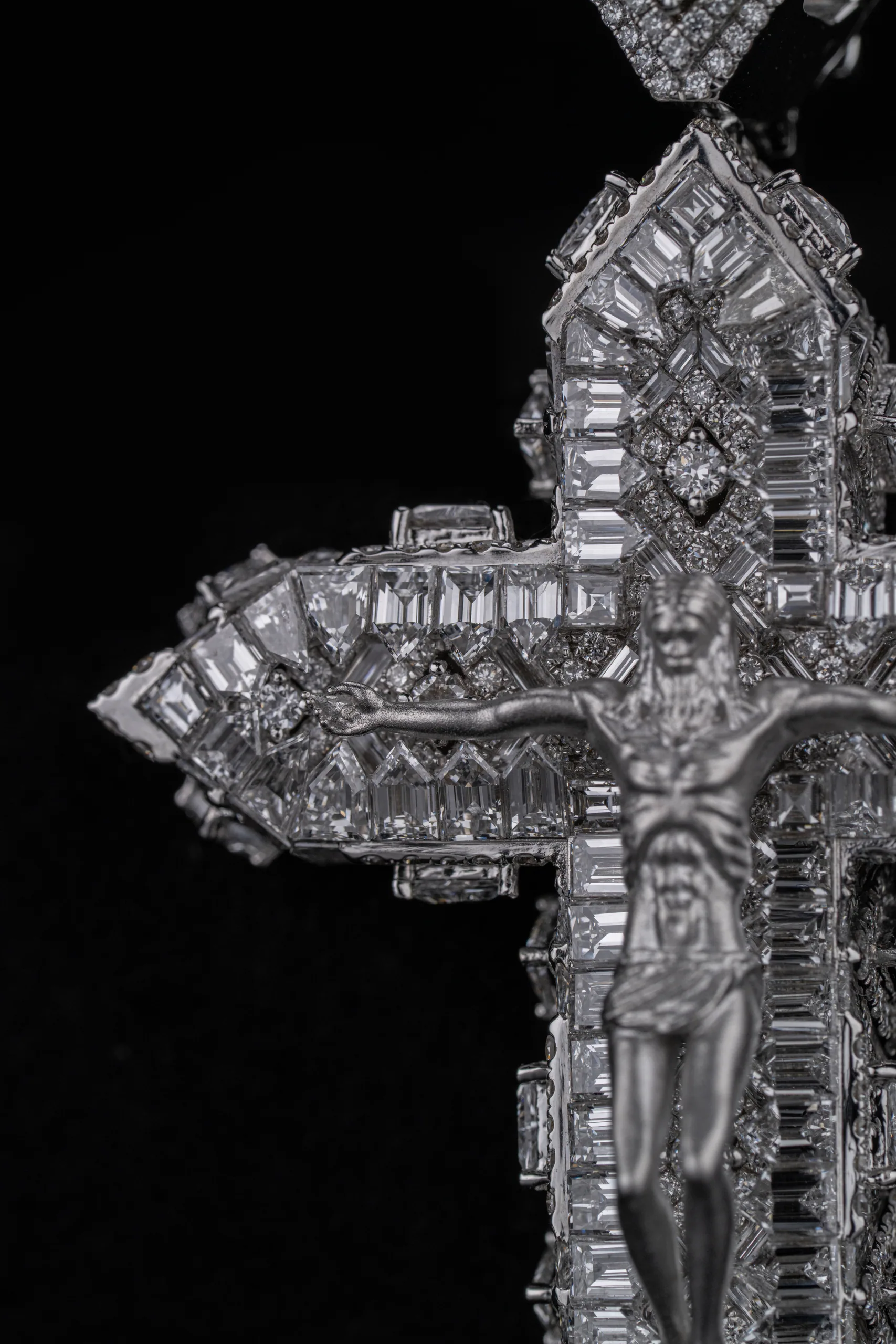 A further detail of the cross against deep shadow.