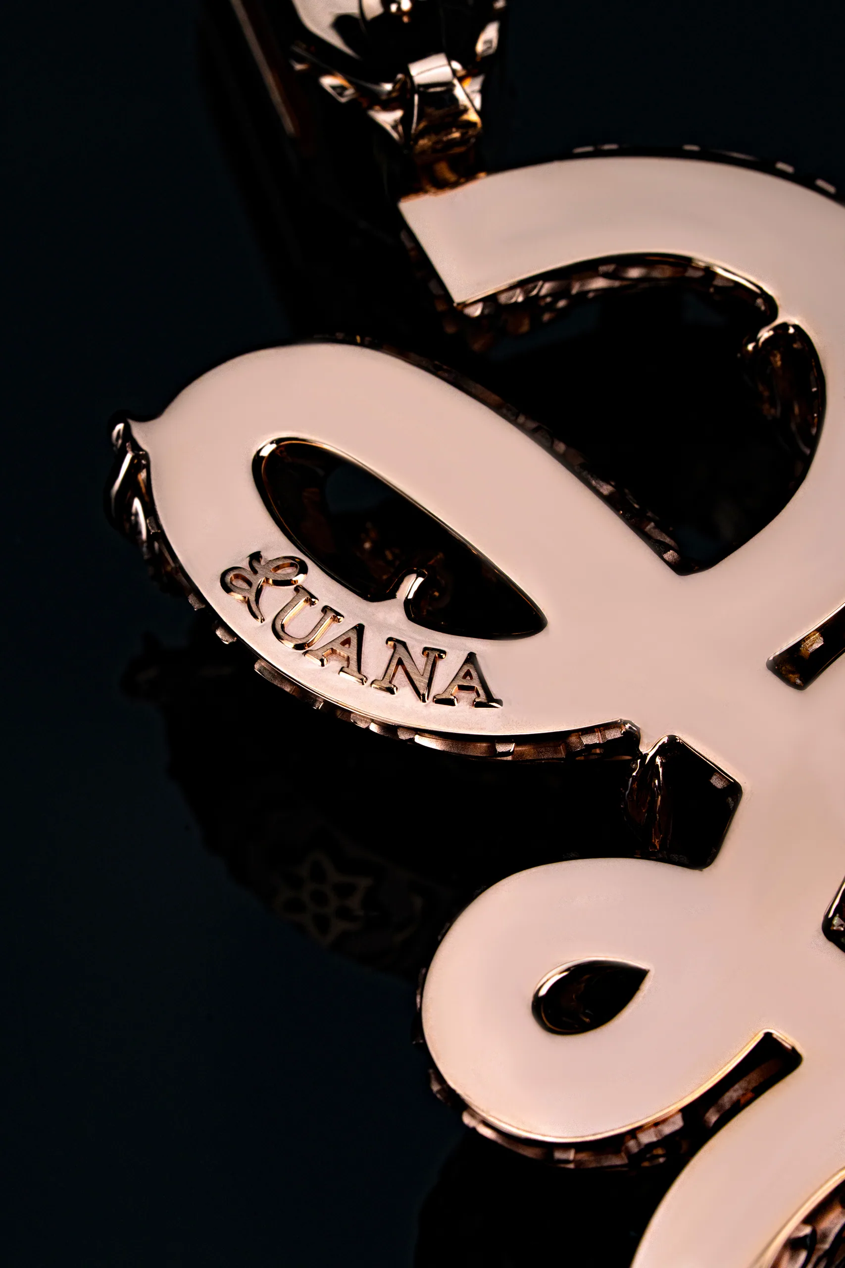 The reverse of the pendant revealing the openwork setting.