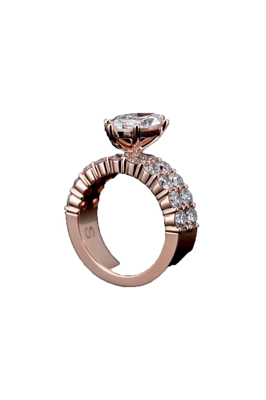 A rose-gold ring cut out against near-black, a marquise-cut diamond raised on claws above a double row of round stones.