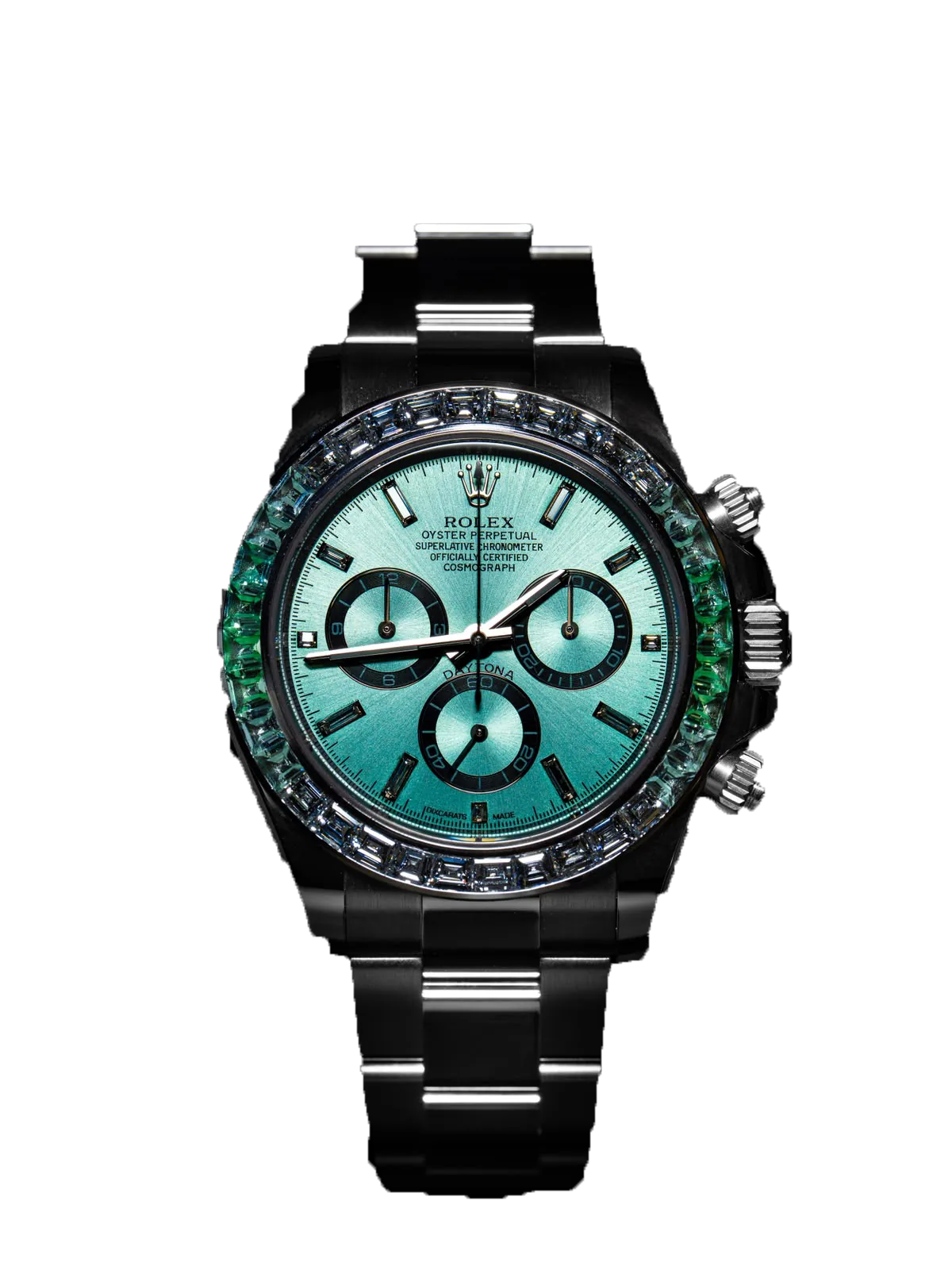 A blackened Rolex Daytona cut out against near-black, its turquoise gradient dial ringed by a bezel set with green stones.